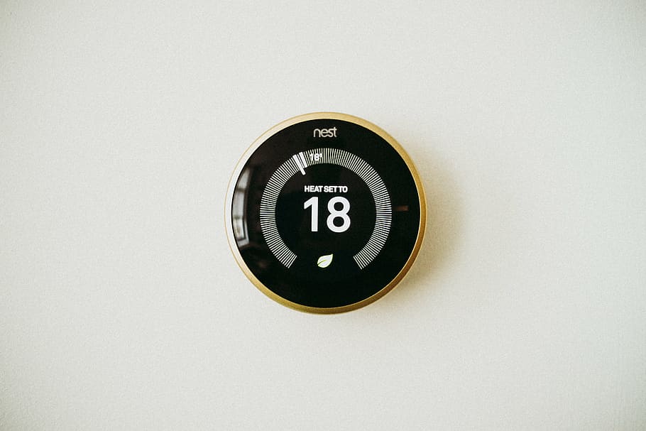 nest, learning, thermostat, displaying, 18, round, circle, black, number, glossy