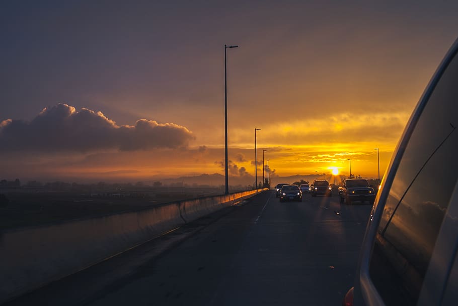 sunset, clouds, sky, highway, road, car, vehicle, transportation, mode of transportation, land vehicle