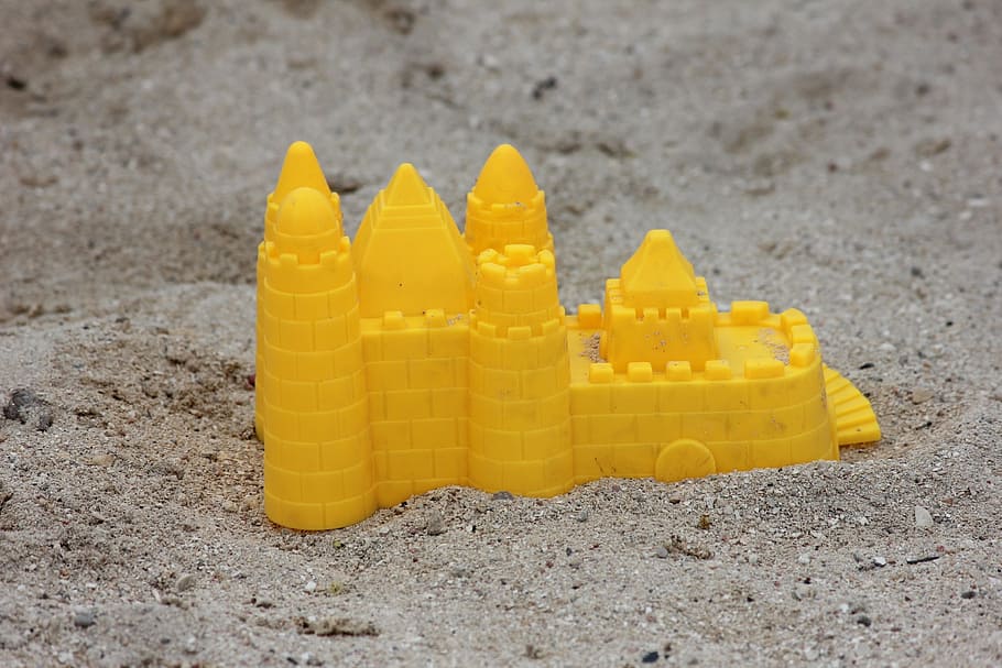 sand toy, toy, sand mold, beach toy, yellow, sand, beach, land, close-up, day