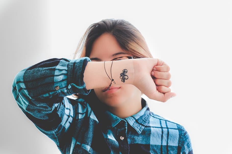 people, woman, tattoo, hand, flannel, eyeglasses, checkered, blue, one person, front view