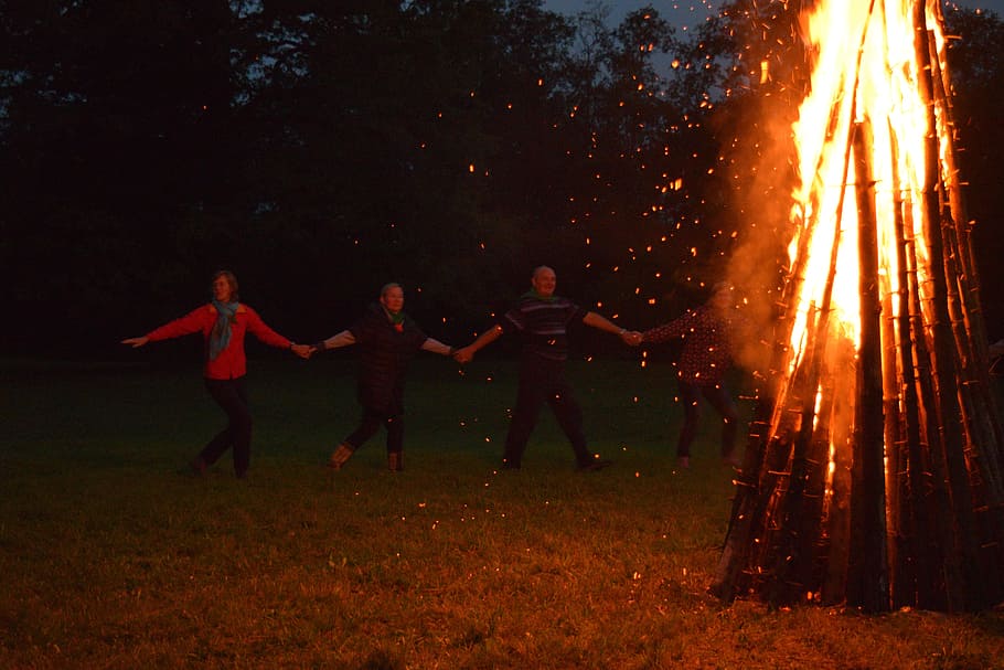 people, holding, hand, standing, front, burned, wood, fire, bonfire, dancing