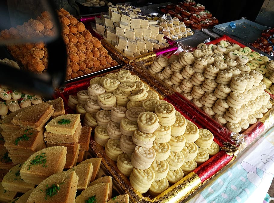 assorted pastry display, diwali sweets, indian sweets, peda, festival, mithai, delicious, burfi, barfi, laddu