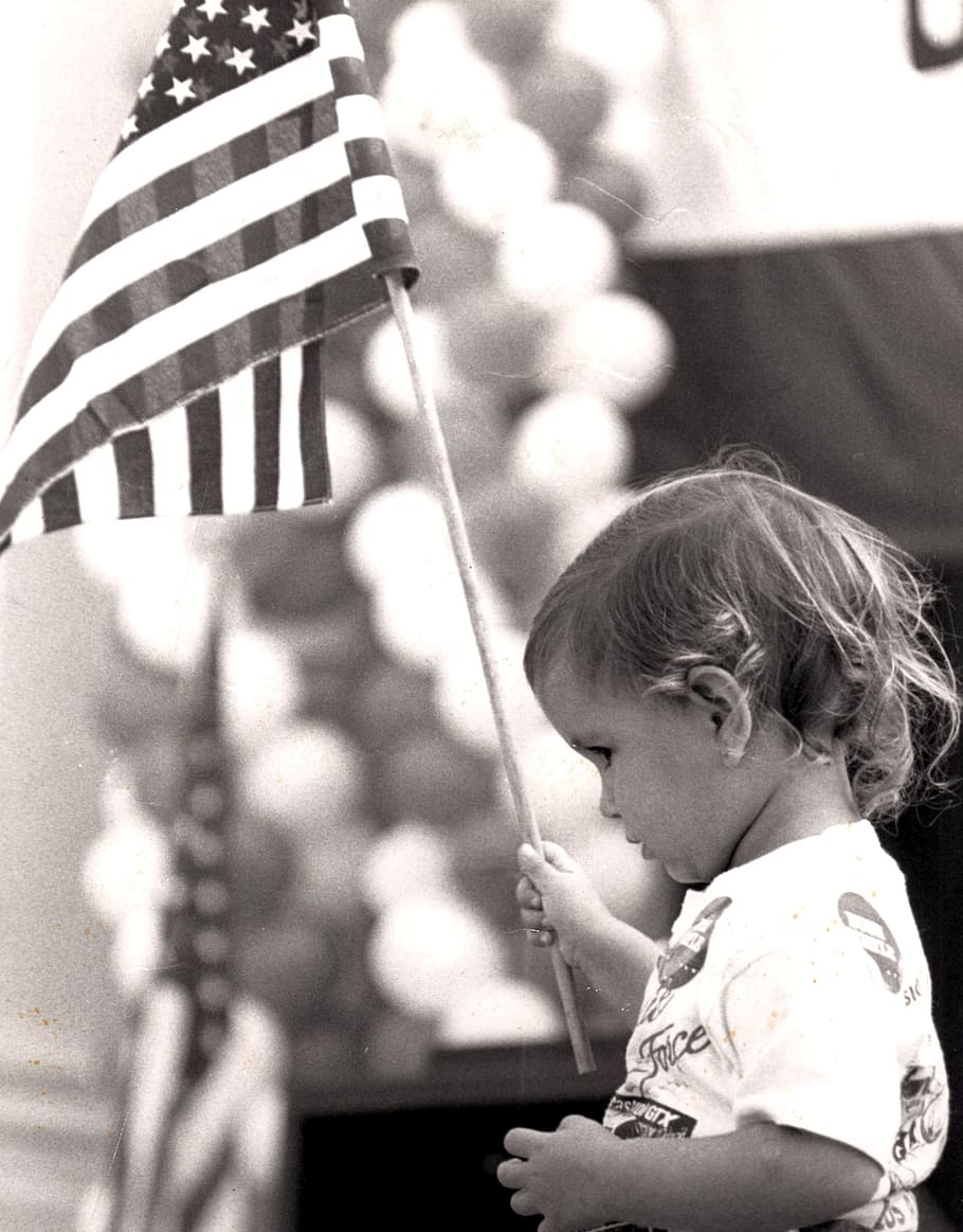 grayscale photo, toddler, holding, u.s.a., flag, election, rally, patriotic, political, presidential