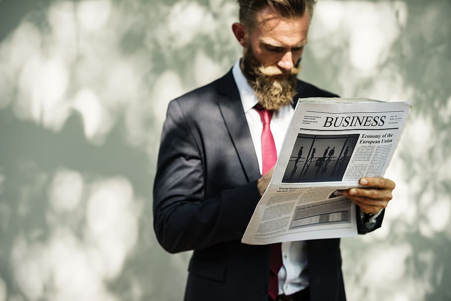 man, holding, business newspaper print, reading, paper, data, business, financial, information, sunlight