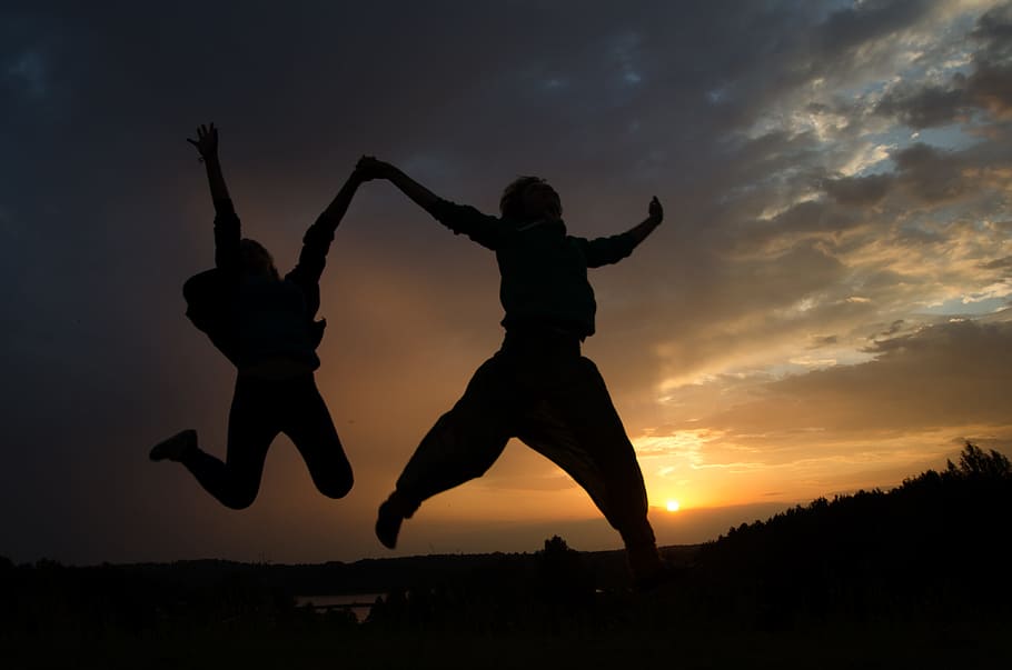 two, person, jumping, holding, daytime, silhouette, persons, golden hour, photography, jump