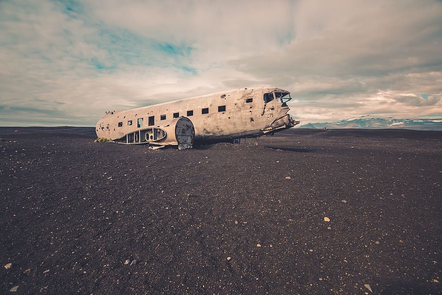 wreck plane, sand, abandoned, clouds, cloudy, mountains, old, outdoors, shipwreck, vehicle