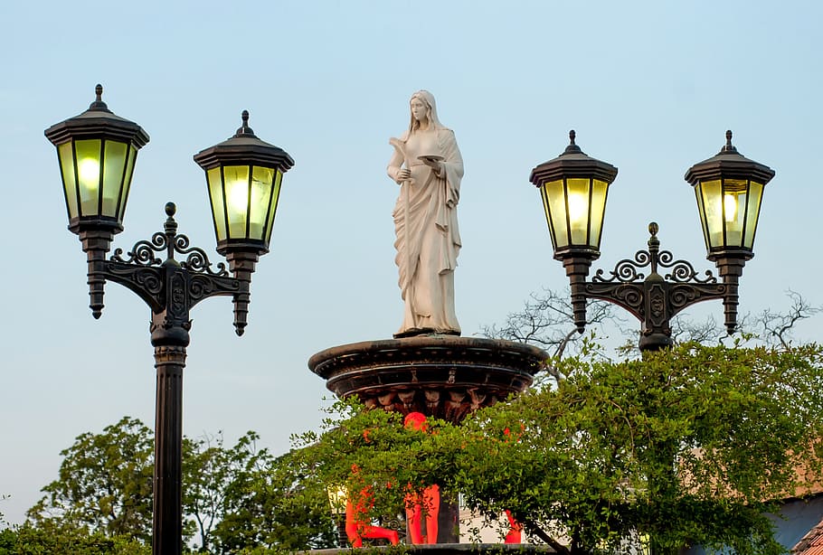 woman statue, placed, street lights, maracaibo, venezuela, statue, monument, sculpture, lamp posts, trees