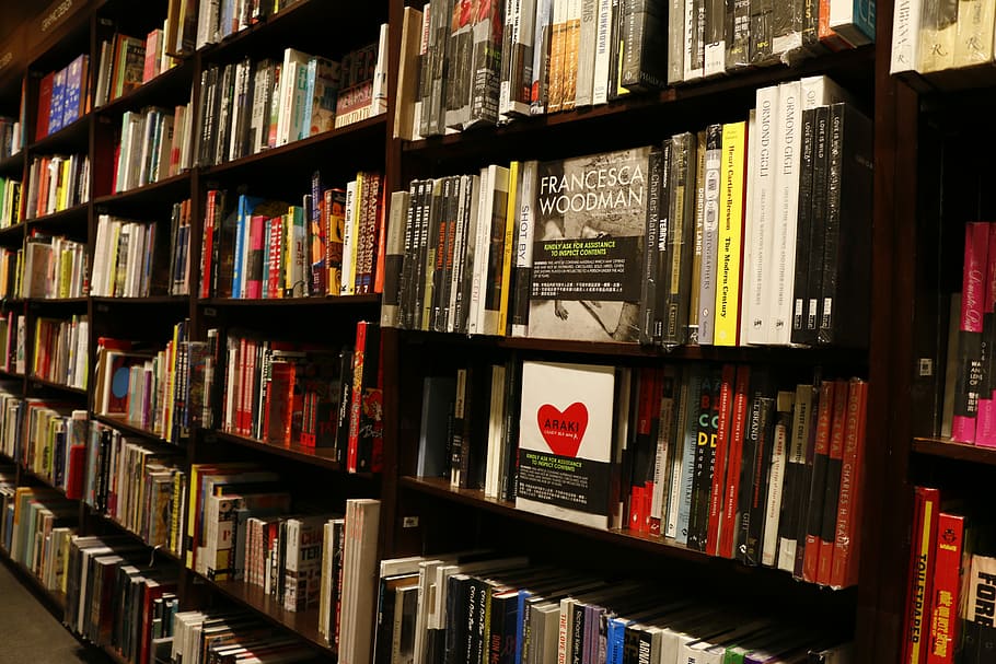 assorted-title book lot, Bookstore, Book, Hong Kong, Library, bookshelf, shelf, indoors, in a row, publication