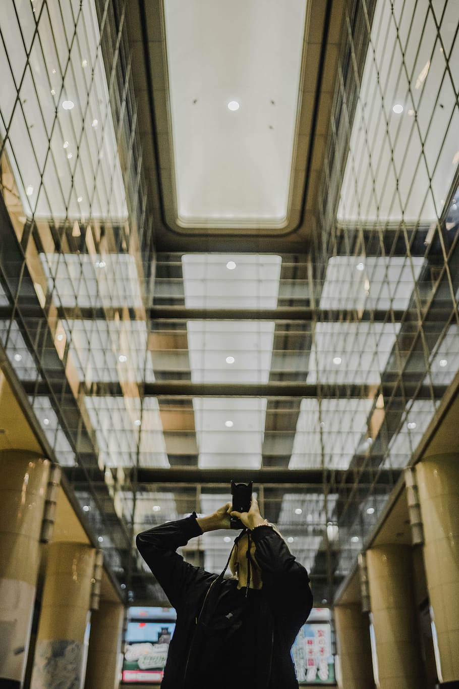 man, using, camera, taking, building, architecture, infrastructure, indoor, glass, reflection