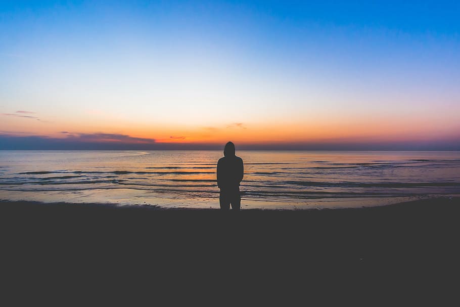 silhouette, man, standing, seashore, sunset, hoodie, jacket, near, body, water