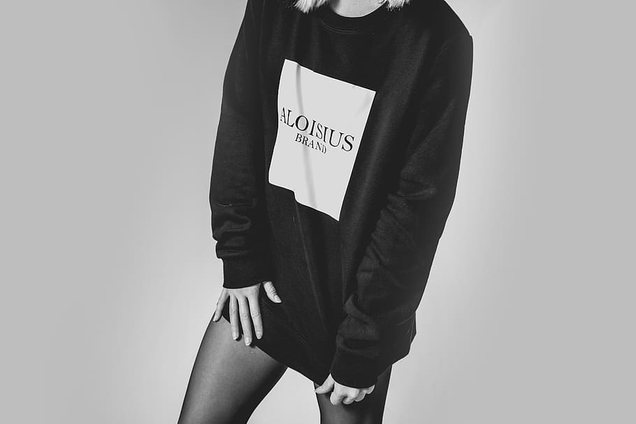 people, woman, black and white, monochrome, sweatshirt, oversized, one person, midsection, white background, studio shot
