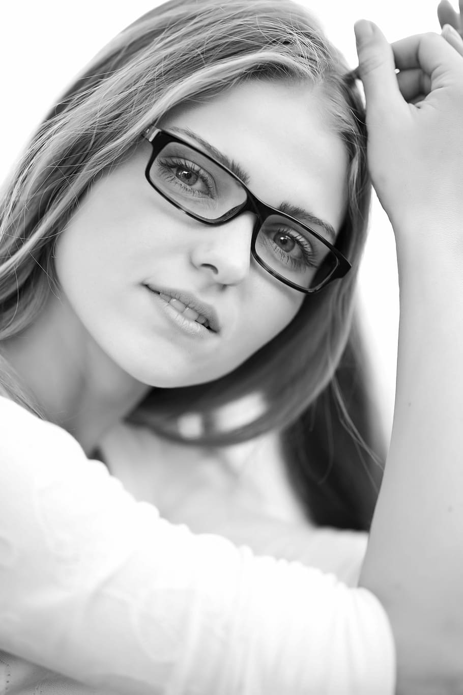 grayscale photo, woman, wearing, elbow-sleeved shirt, eyeglasses, model, women's, exposure, beauty model, young model