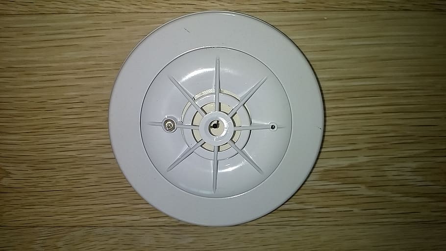 fire detector, differential smoke detectors, differential probes, geometric shape, indoors, circle, shape, directly above, single object, close-up