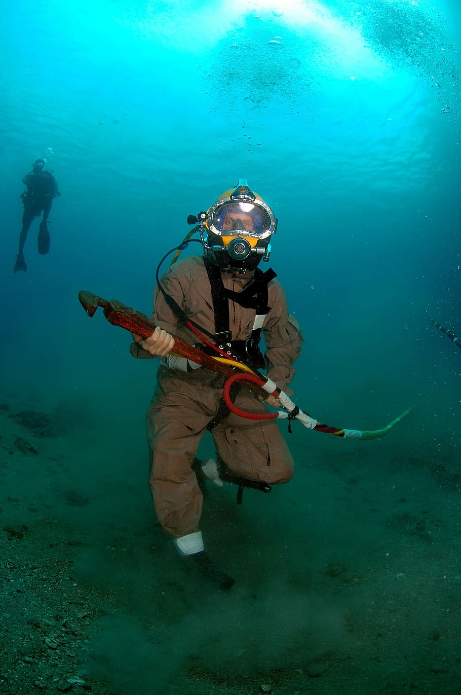 diver, salvage, navy, military, ocean floor, walking, wrench, tool, equipment, working