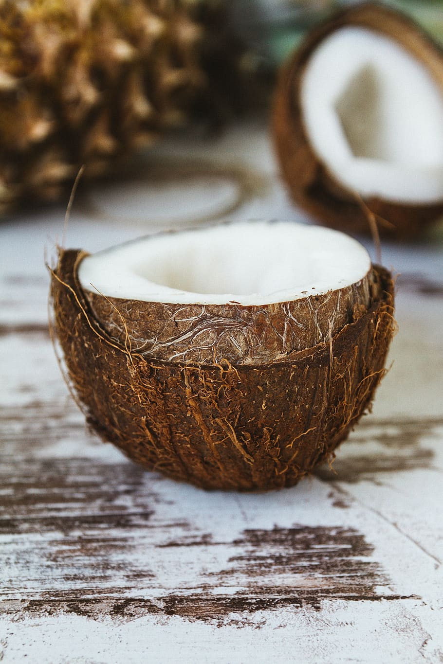 slice of coconut, close, coconut, shell, brown, fruit, food, dessert, table, ingredient