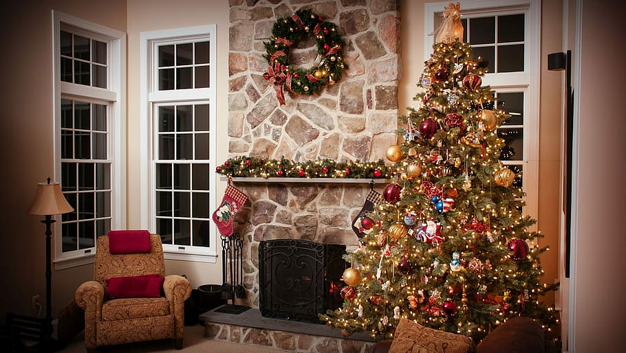 green, christmas tree, string lights, bauble, room, fireplace, sofa, chair, christmas decorations, decoration