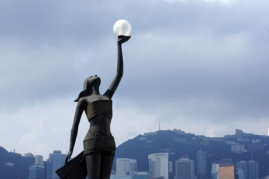 woman, raising, clear, glass globe, cityscape, hong kong skyline, skyline, chinese, architecture, harbor