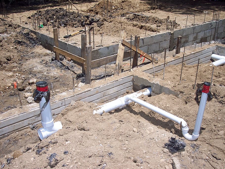 white, pvc pipes, concrete, wall, plumbing, cement, foundation, building, construction, belize