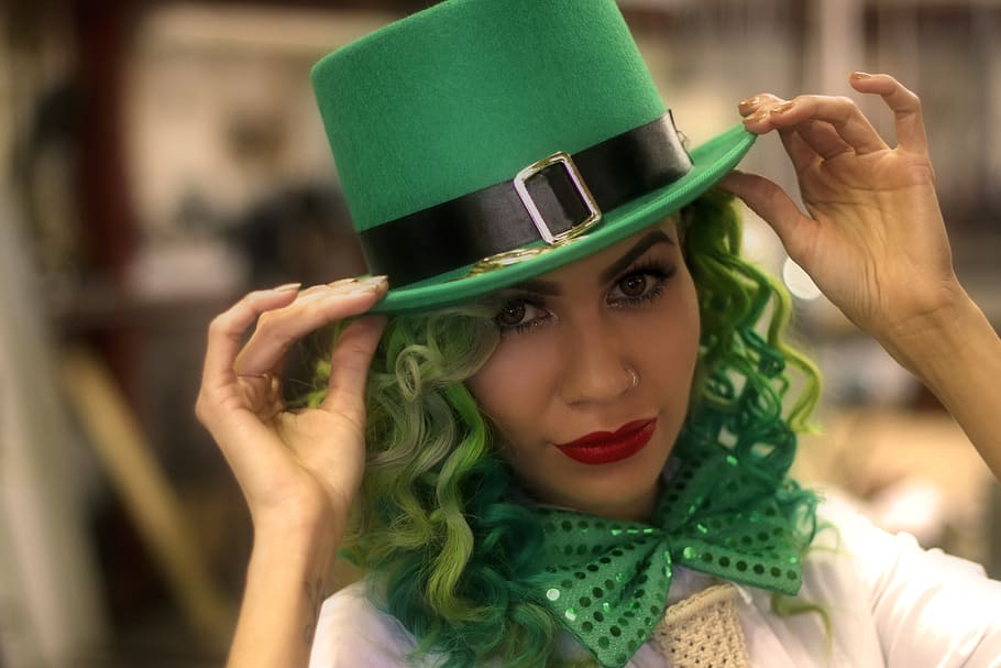cute lady dressed in St. Patrick's Day outfit as a leprechaun, Irish folklore is known all over the English world