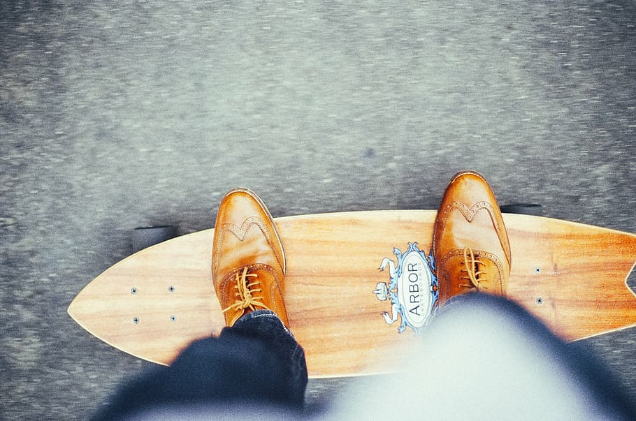 person, standing, longboard, brown, cruise, board, skateboard, shoes, leather, laces