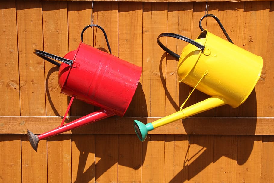 red, yellow, metal, watering, cans, hanging, brown, gate, garden, farm