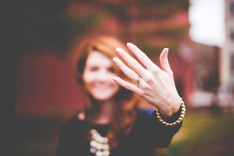 hand, finger, palm, ring, bracelet, people, woman, blur, one person, focus on foreground