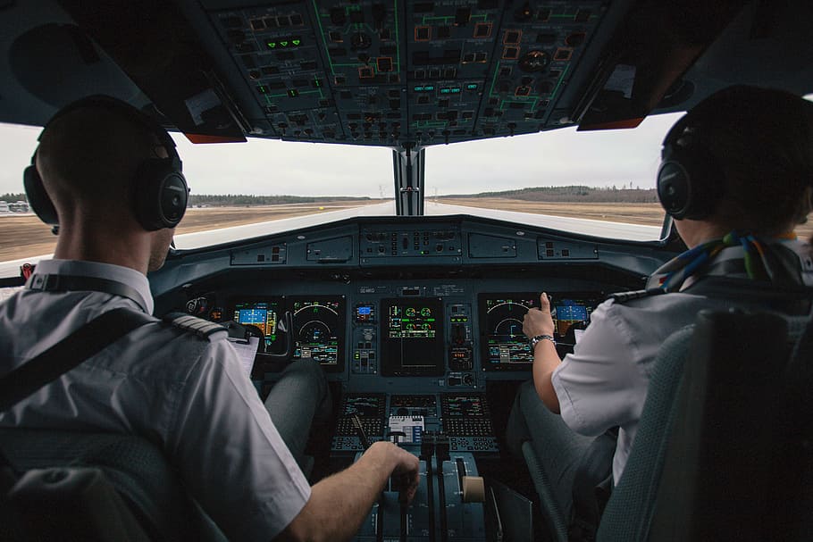 two, pilots, sitting, cockpit seats, cockpit, pilot, people, men, airplane, travel
