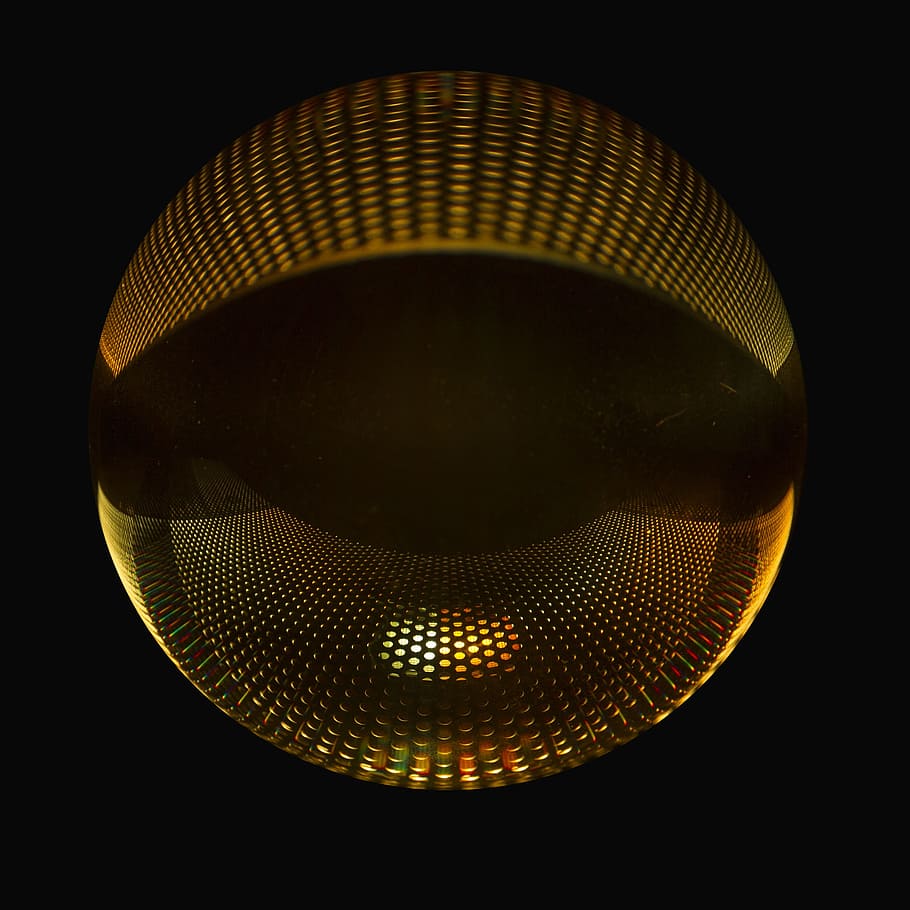 photo sphere, glass ball, ball, perforated sheet, black background, studio shot, indoors, close-up, single object, nightlife