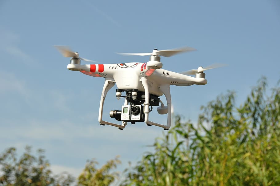 red, white, dji, phantom, drone, hovering, sky, tree, day, aerial photo