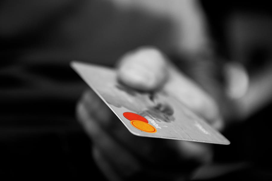 cartão de crédito, pagamento, dinheiro, moeda, finanças, dívida, gastos, close-up, foco em primeiro plano, objeto único