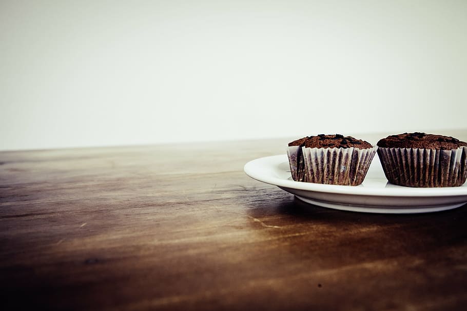 two, chocolate cupcakes, white, plate, brown, table, chocolate, cupcake, food, dessert