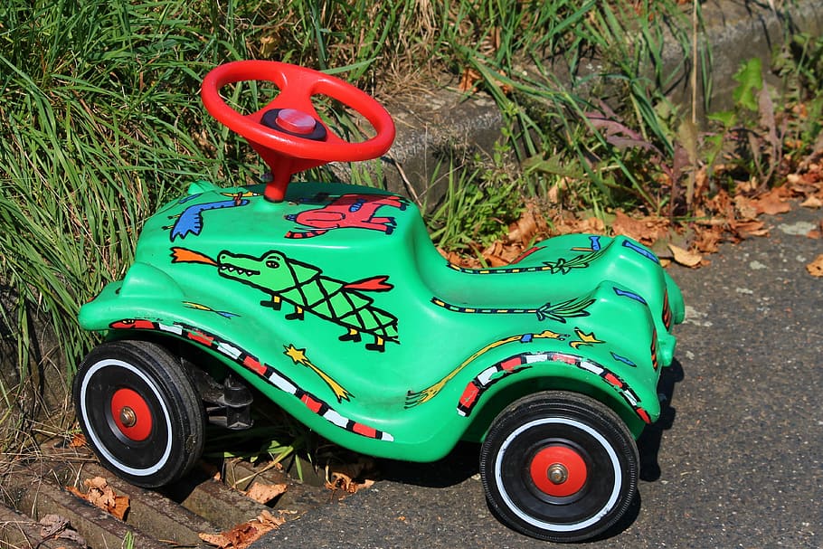 toy car, colorful, painted, parked, parked up, roadside, plastic car, toys, painting, steering wheel