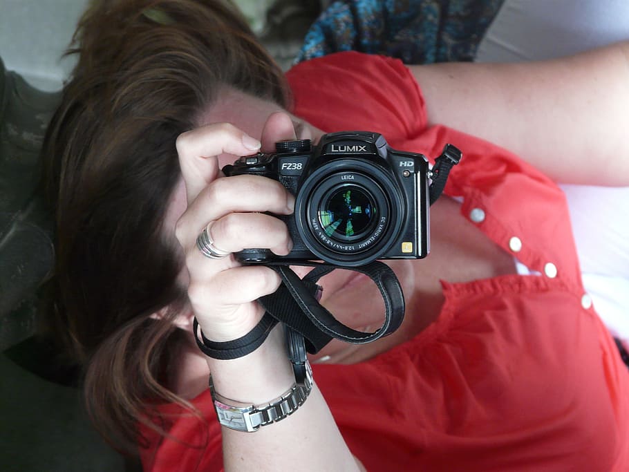 woman, holding, black, lumix dslr camera, photographer, photograph, hand, attitude, single hand, reporter