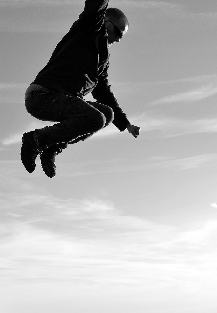 man, jump, jumping, flying, black and white, sky, high, one person, mid-air, leisure activity