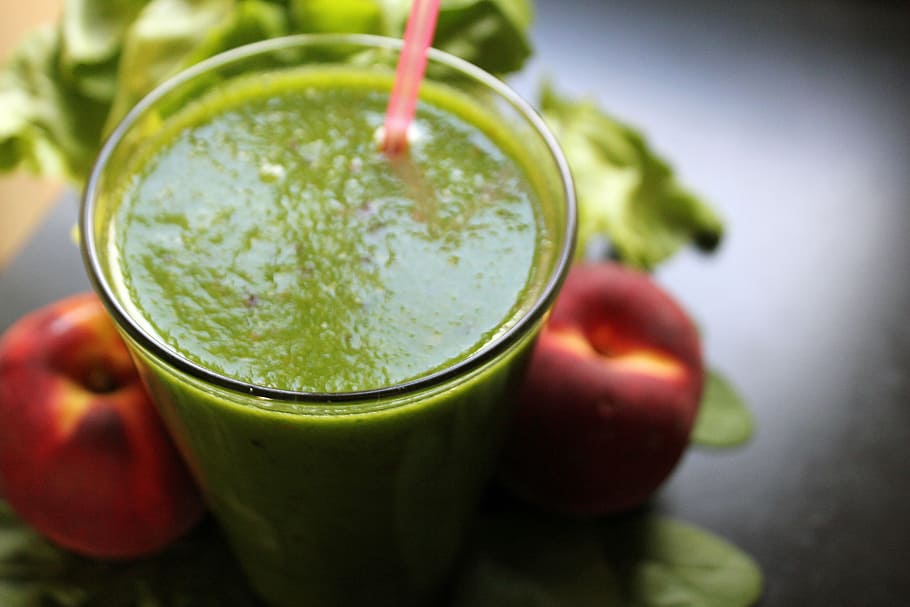 selective, green, liquid, filled, clear, glass, red, straw, smoothie, spinach