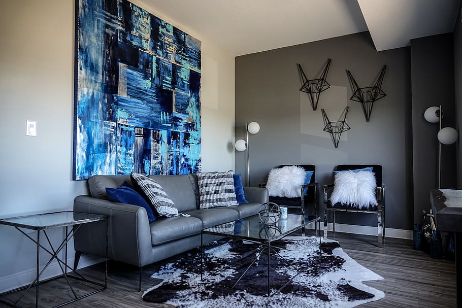 living room, blue, blue painting, painting, wall decor, abstract art, abstract wall hangings, grey couch, grey, modern