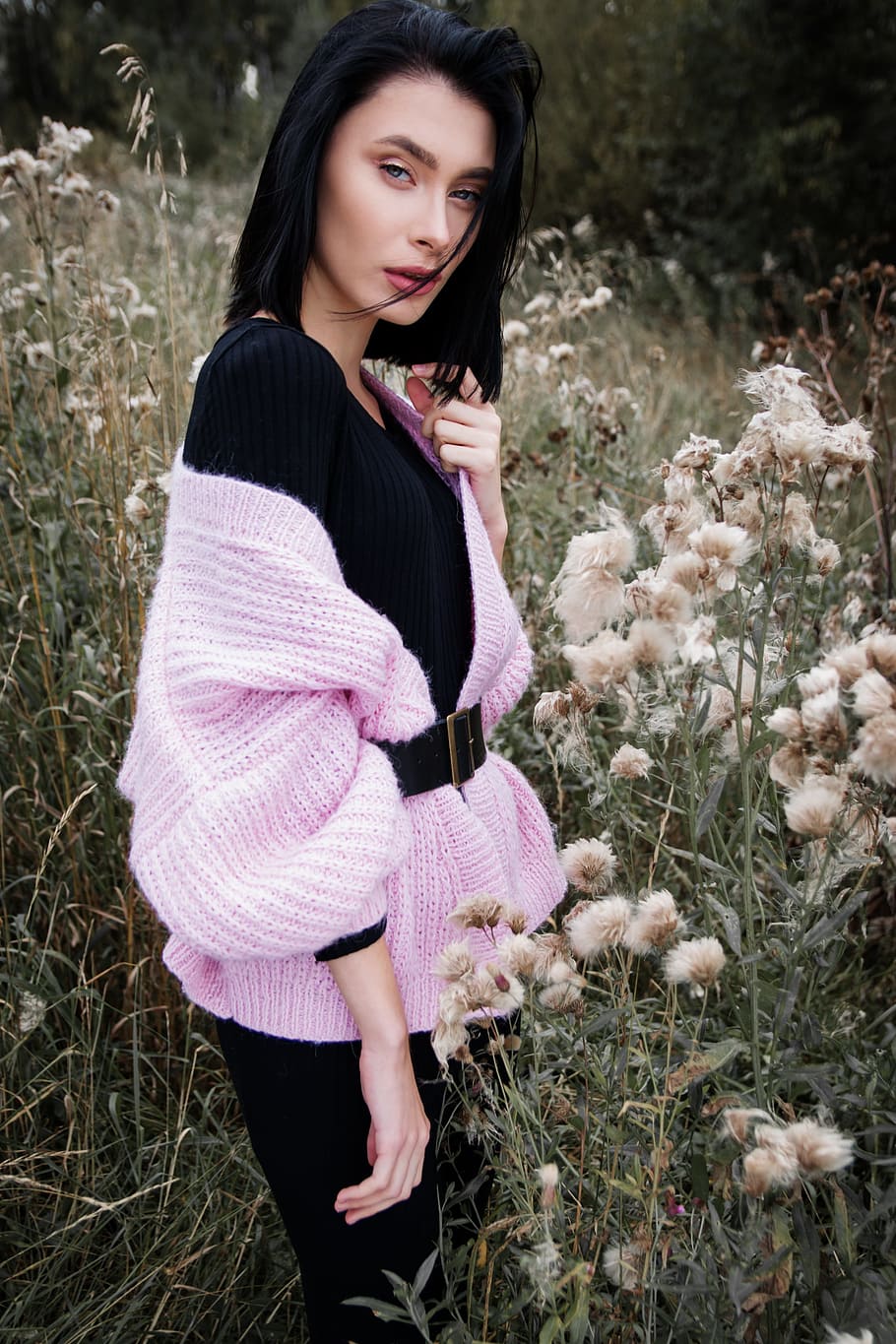 woman, wearing, black, pink, dress, flower field, girl, brunette, sweater, forest