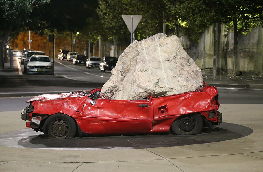 red, car, squashed, gray, stone, crushed, art, modern, sculpture, mode of transportation