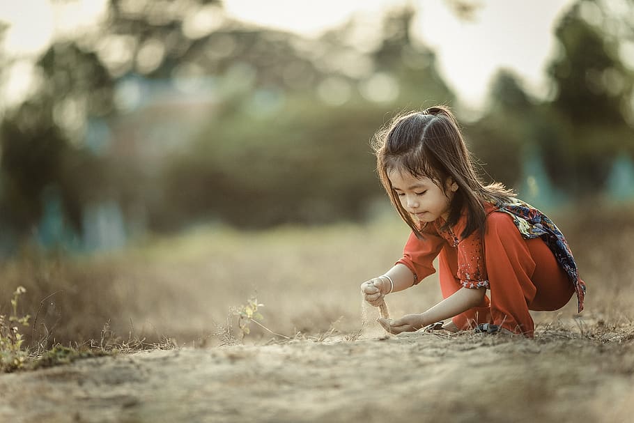 people, girl, child, kid, alone, grass, playing, sand, bokeh, childhood