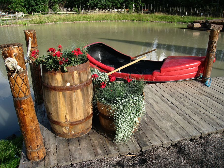 red, boat, docked, barrel, petaled flowers, götene, adventure land, water, park, bridge