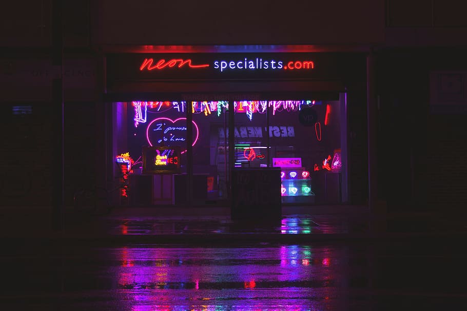 store facade, neon specialists.con, dark, night, neon, signage, shop, store, lights, wet