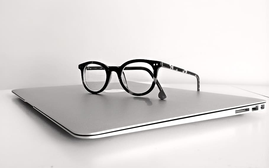 black, framed, clubmaster-style eyeglasses, top, macbook air, macbook, laptop, computer, technology, business