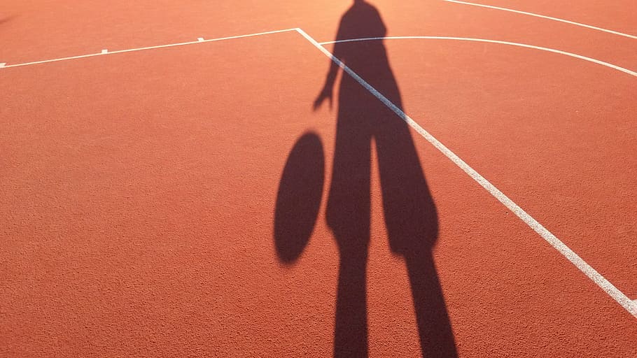 silhouette, person dribbling, ball, basketball, shadow, space, sport, outdoor, in the, competition