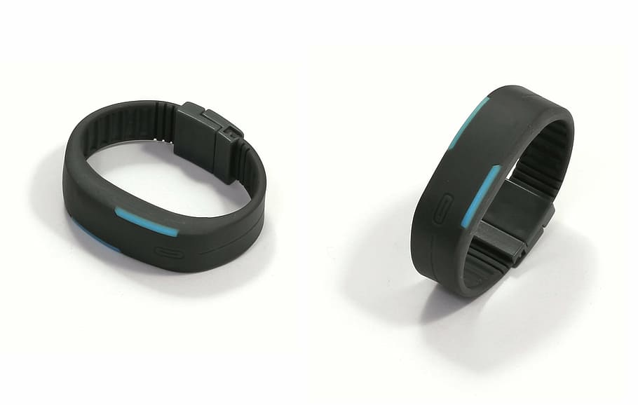 two, blue-and-black fitness trackers, white, background, bracelet, plastic, wrist, sports, fitness, pedometer
