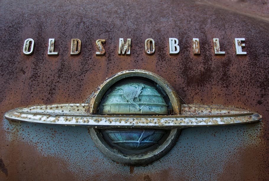 olds rocket 88, oldsmobile, car badge, chrome, rust, old, vintage, classic, metal, text