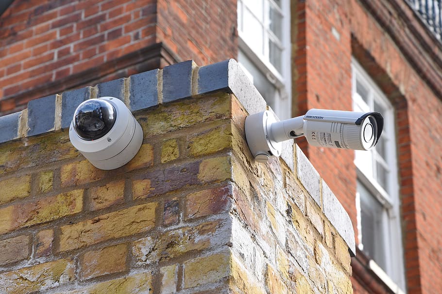 two, white, assorted-type wall, mounted, security cameras, brown, brick wall, cctv, camera, security