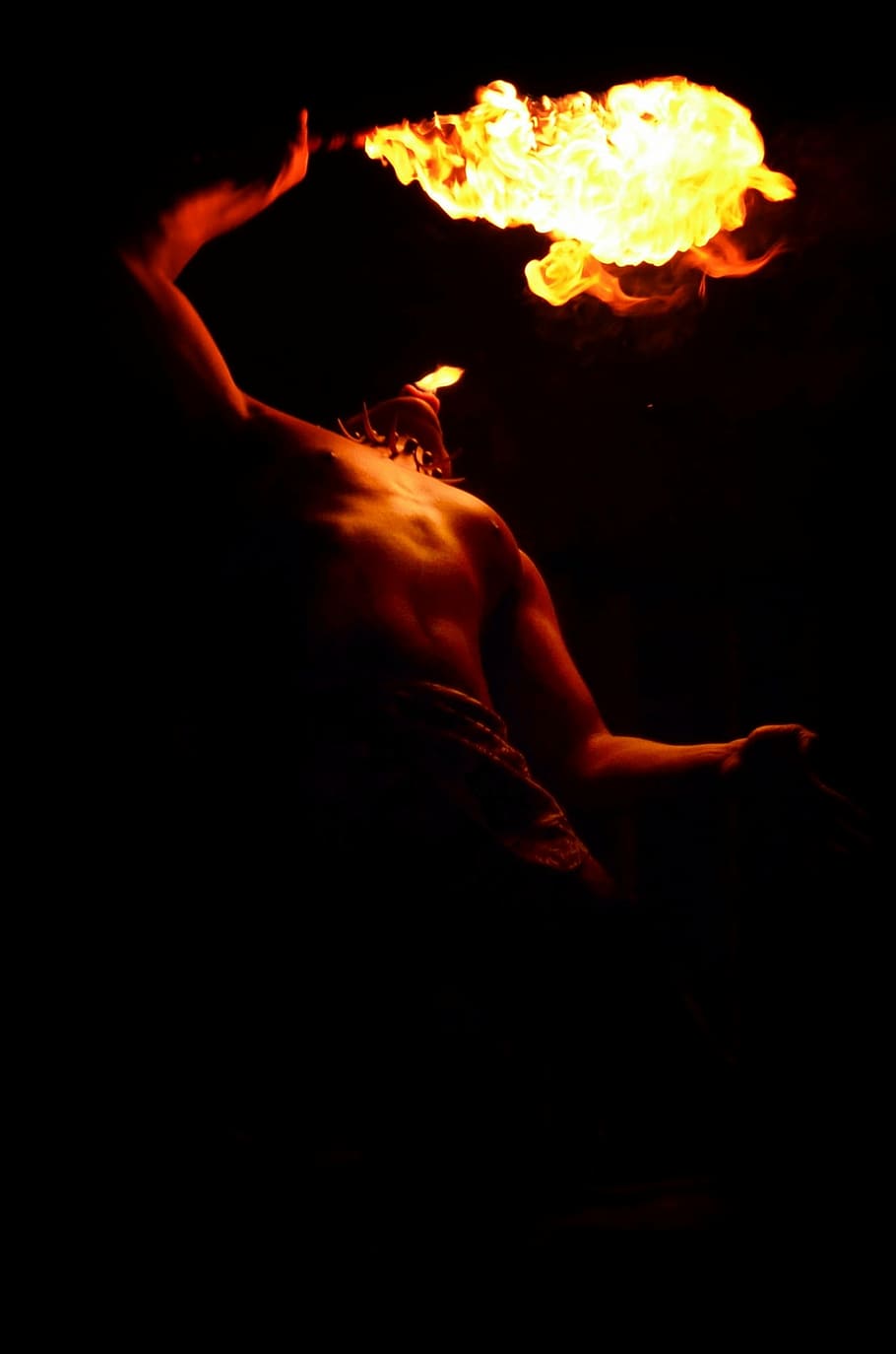 man playing fire, fire, torch, hawaii, flame, performance, luau, human body part, danger, heat - temperature