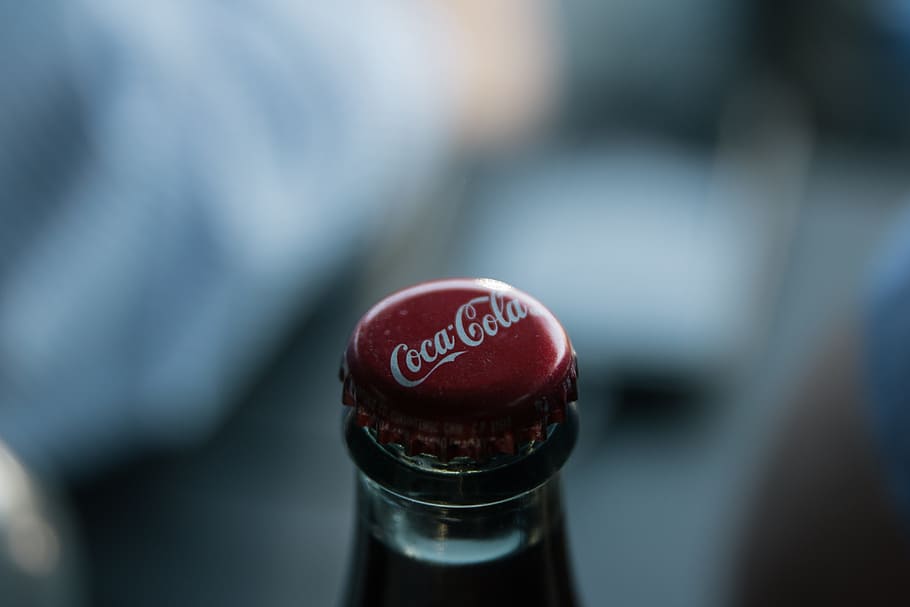 coca-cola soda bottle, coca-cola, soft drink, soda, beverage, bottle, red, focus on foreground, food and drink, close-up