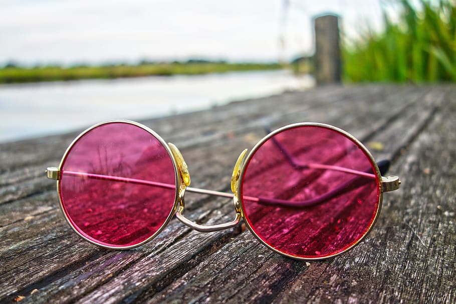 round silver-colored, pink, tinted, sunglasses, grey, wooden, board, glasses, lens, frame