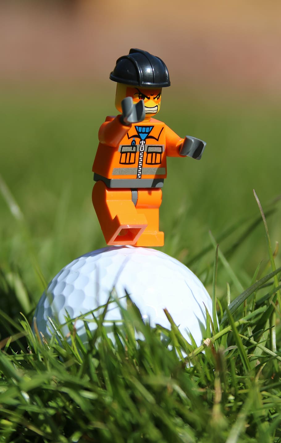 golf, golf ball, angry, funny, toy man, man, grass, face, expression, furious